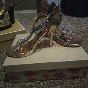 Gold high heels